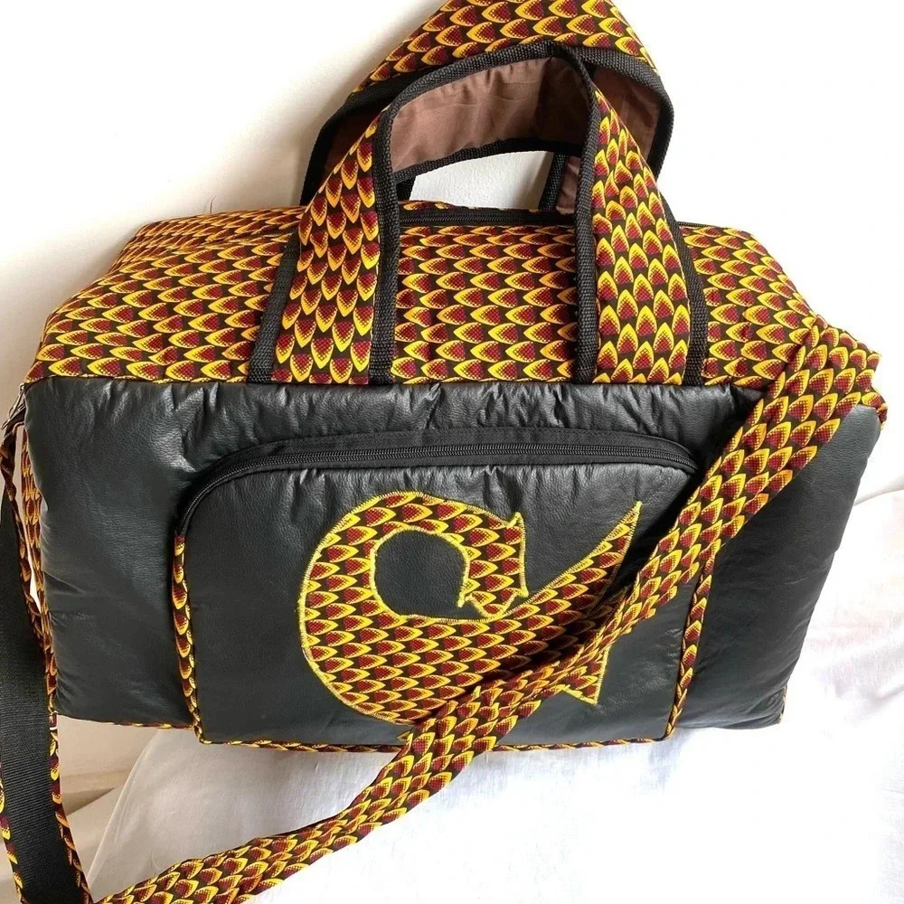 Handmade unisex Ankara print!& vinyl duffel weekend bag